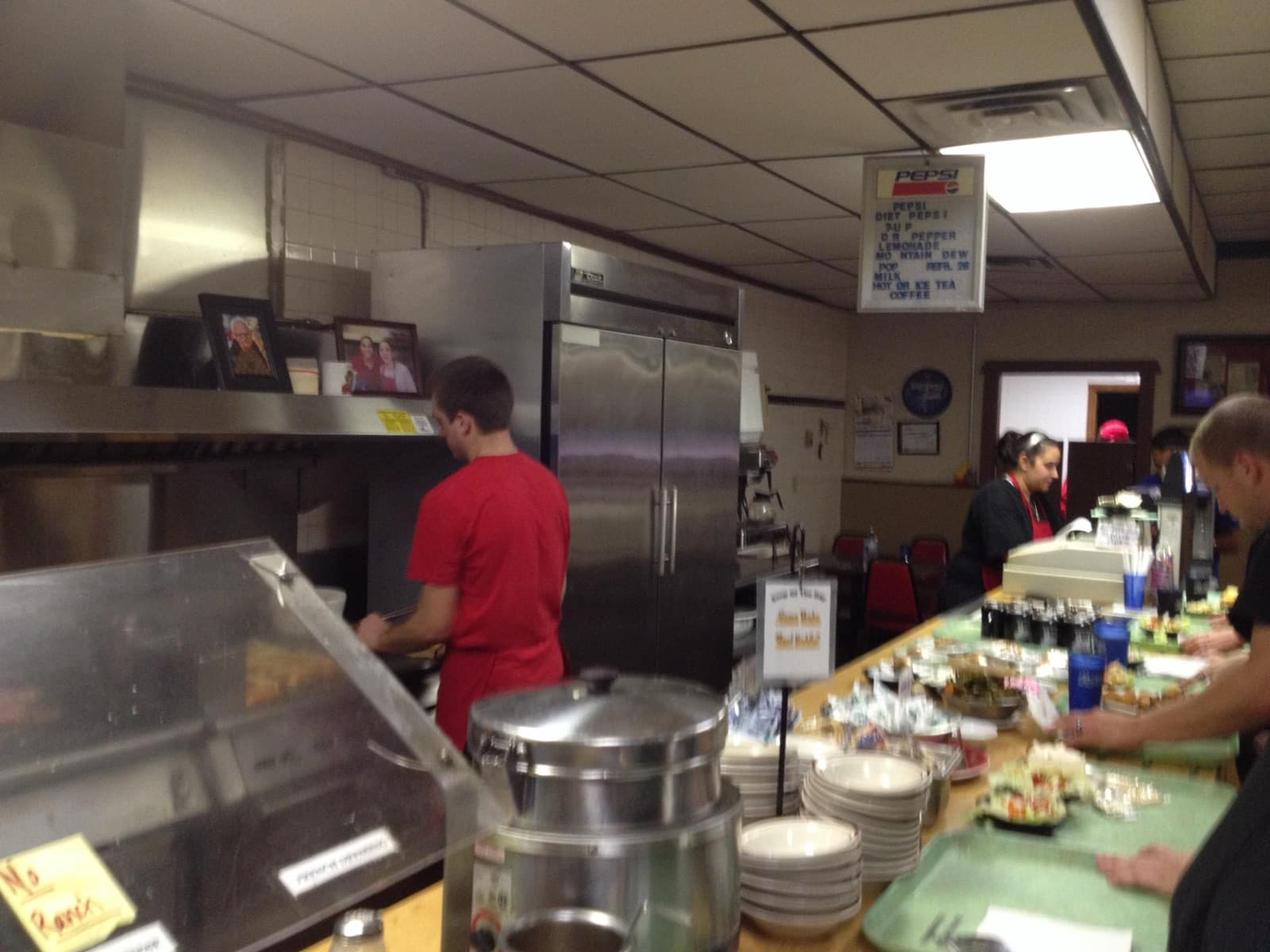 Staff working the kitchen counter